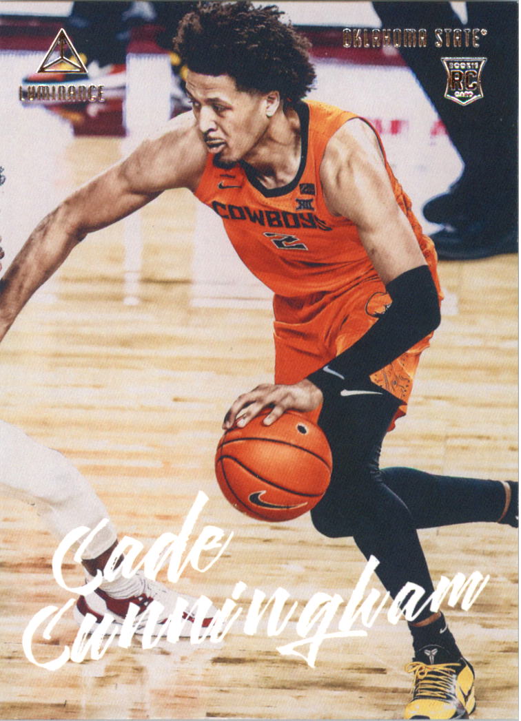Hardwood basketball trading card featuring Cade Cunningham in Oklahoma State Cowboys uniform dribbling the basketball on the court.