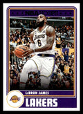 NBA Hoops trading card featuring LeBron James in Los Angeles Lakers uniform going for a layup with crowd in the background.